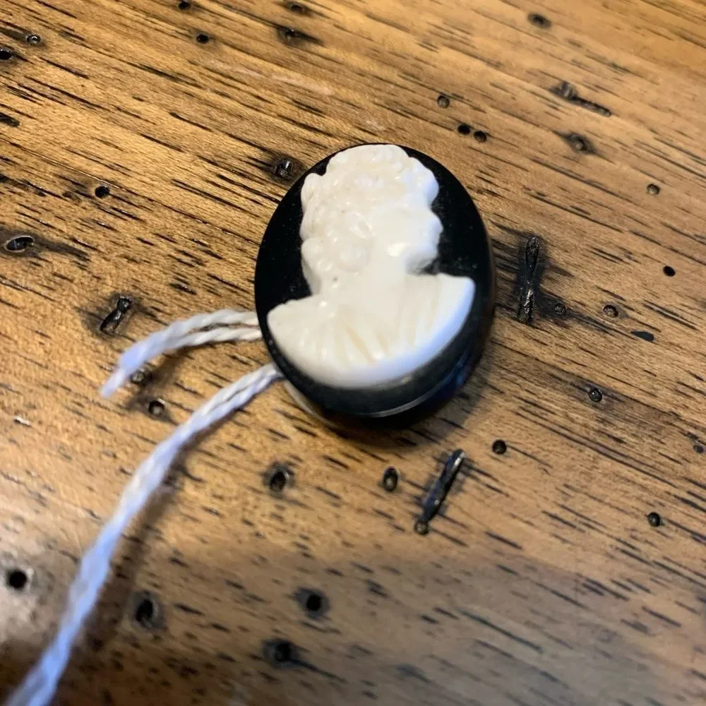 Antique black and white cameo pendant